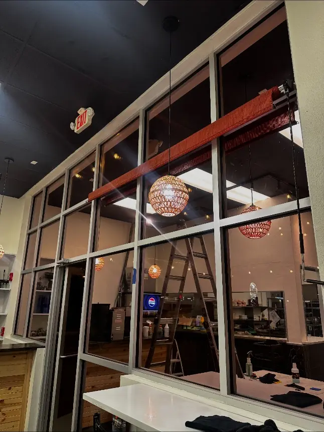 Filmed glass partition wall inside an Albuquerque restaurant